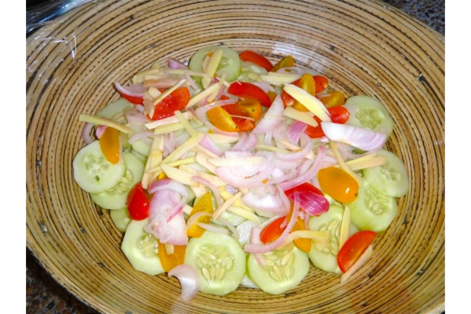 my version of the ilipino cucumber salad recipe Filipino cucumber, tomato, onion, ginger and vinegar salad