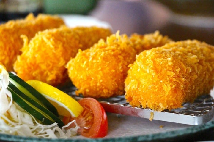 My favourite next. Creamed corn croquettes. Come on creamed corn, mashed potato, bread crumbed and deep fried and served with a tangy brown sauce - how can you not dig this one?