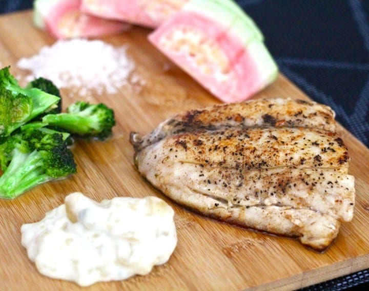 Butter fried fish with pink guava, broccoli and macadamia tartare sauce