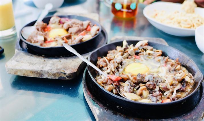 Sisig, the multi-personality Filipino dish