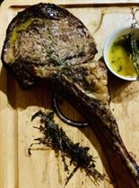 Tomahawk reverse-seared to medium-rare perfection and then charred