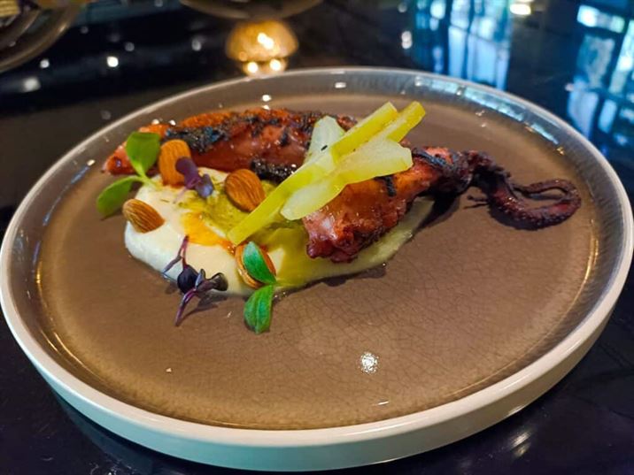 Grilled Fremantle Octopus Parsnip Celeriac Puree Green Harissa Pickled Star Fruit Toasted Almonds