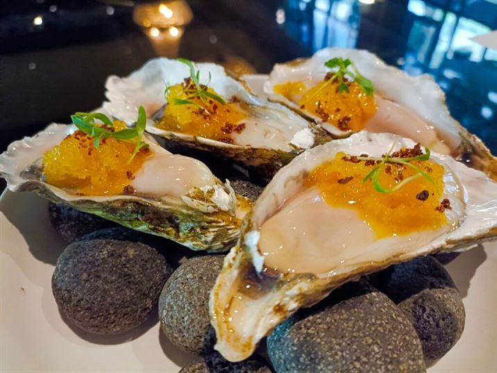 Siri House - Miyagi Oysters with Passionfruit Granite Shiraz Gin Pink Peppercorn and Shiso Oil