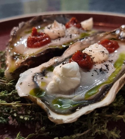 Italian Flag-inspired Oyster creation! Vibrant red tomato reduction, creamy white Robiola from the Langhe, and fresh green basil