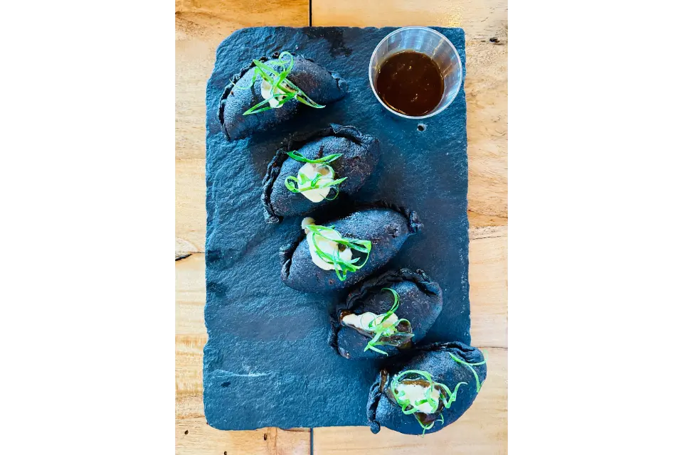 The Monkey Bar by Chef Jenzel Fontilla best restaurants in panglao bohol empenadas with charcoal