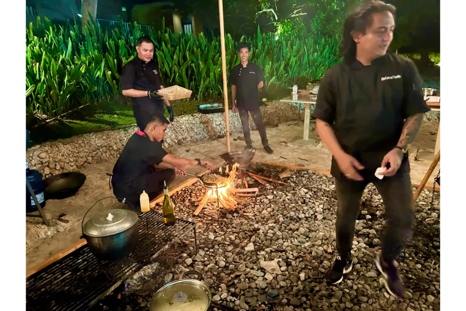 the monkey bar restaurant BE grand resort .panglao the philippines chef and crew in the bbq pit