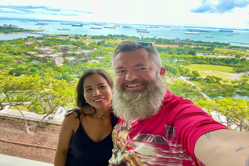 marina bay sands review balcony shot of me and wifey