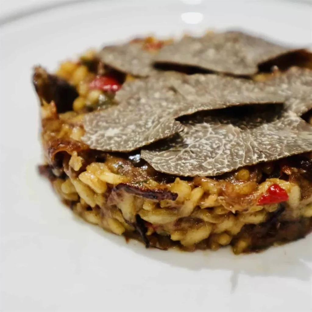 gaig restaurant reviews slow-braisd oxtail paella with truffle