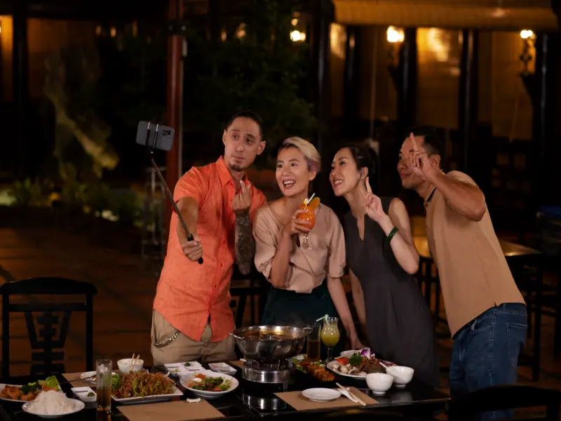 asian people having dinner party Where to Eat in Singapore After a Late-Night Arrival