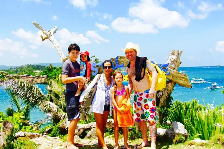 boracay review family at crystal cove sign